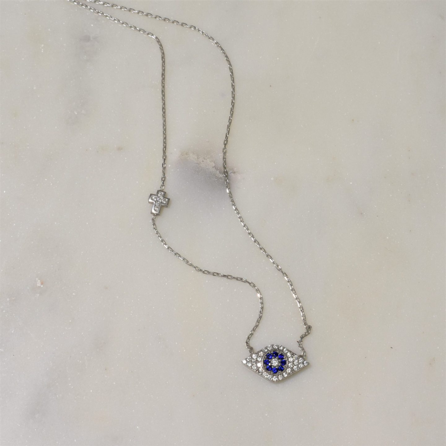 Blue Sapphire Evil Eye Cross Necklace